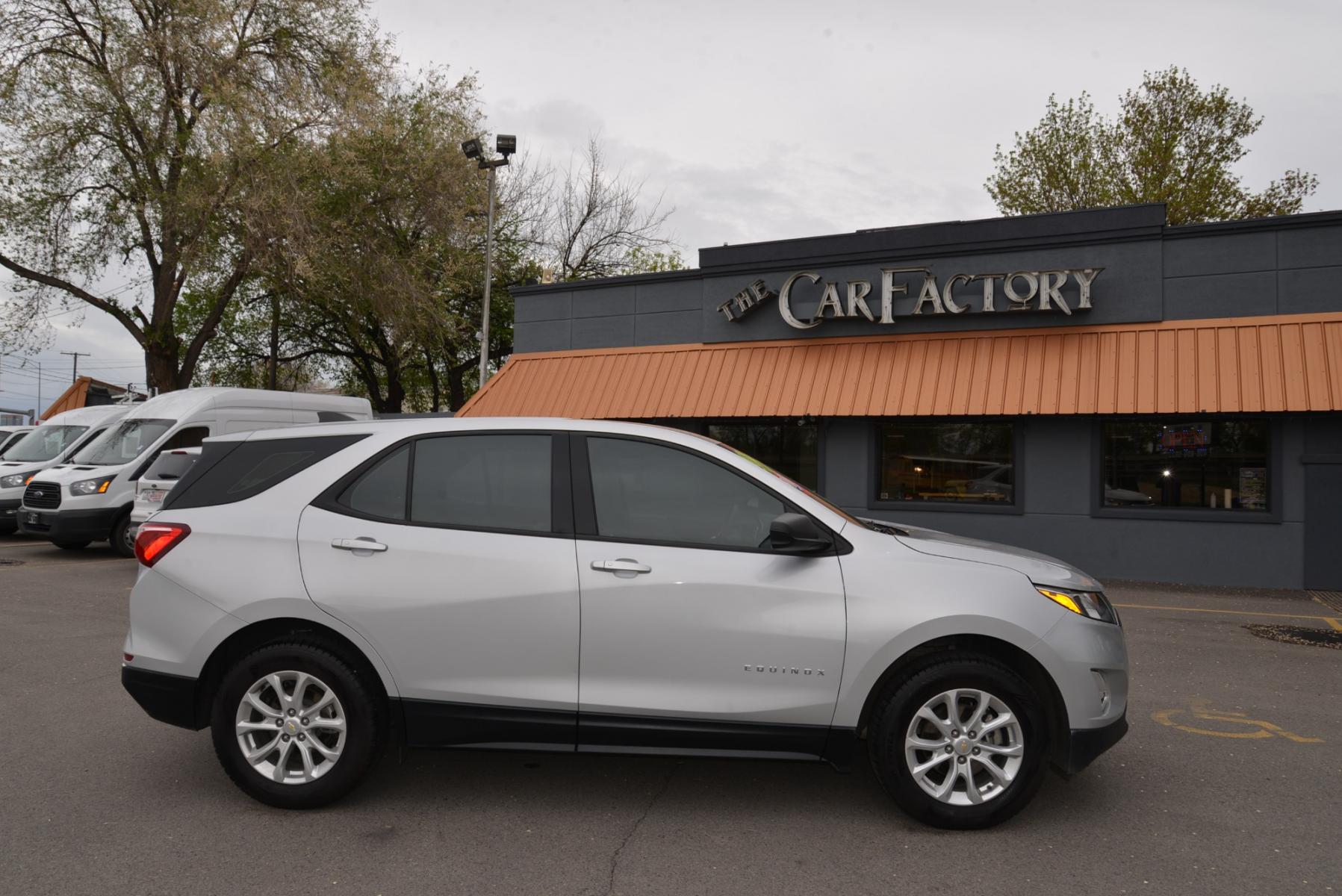 2018 Silver /Gray Chevrolet Equinox LS AWD (2GNAXREV3J6) with an 1.5L Turbo 4 cylinder engine, 6 speed automatic transmission, located at 4562 State Avenue, Billings, MT, 59101, (406) 896-9833, 45.769516, -108.526772 - 2018 Chevrolet Equinox AWD - One owner - Low miles! 1.5 Turbo 4cylinder engine - 6 speed automatic transmission - All wheel drive - LS package - 63,527 miles - One owner! LS package - air conditioning - tilt and telescoping steering wheel - cruise control - touchscreen blue tooth audio - steer - Photo #1